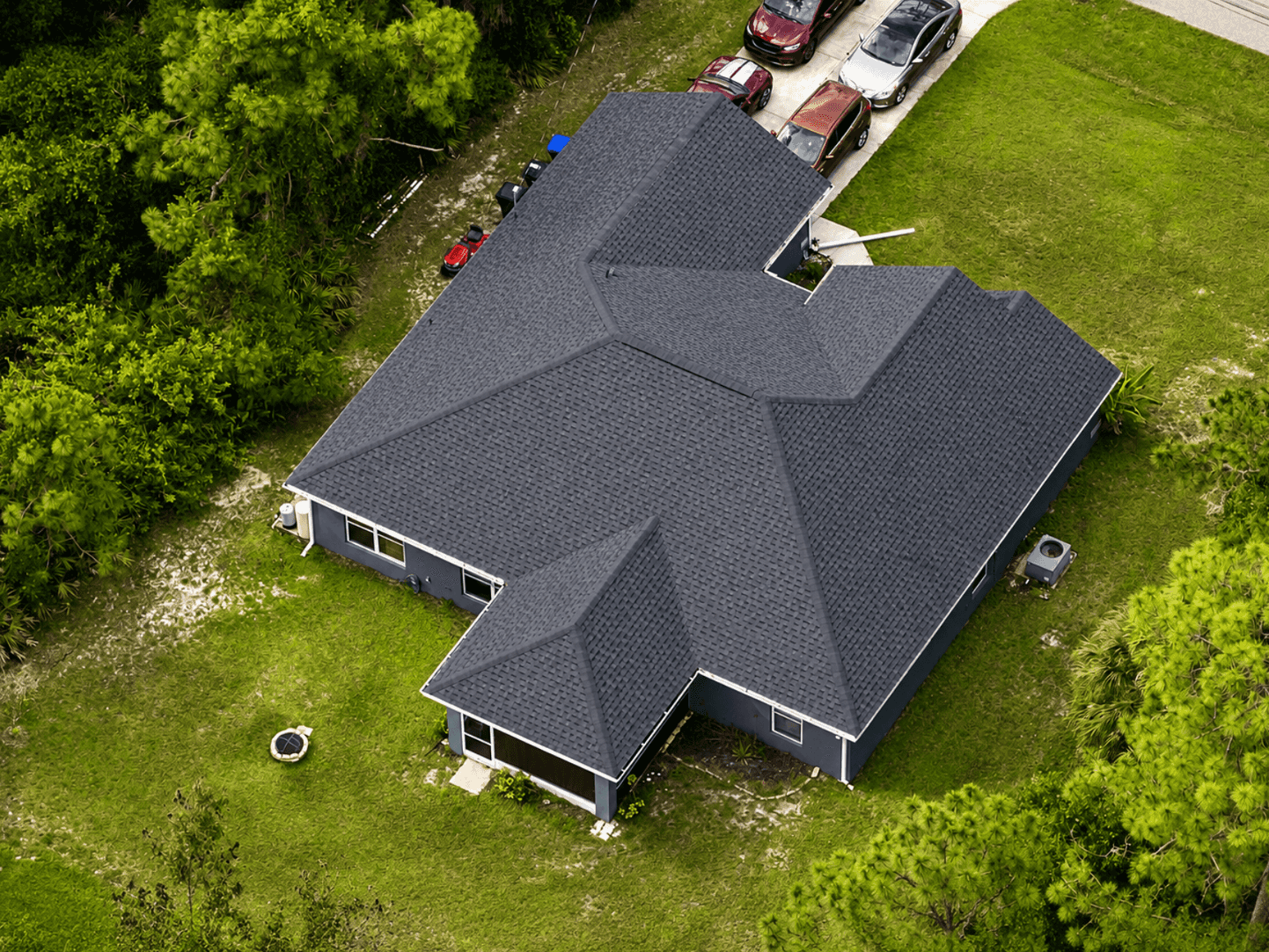 Aerial view of a completed residential asphalt shingle roof